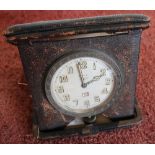 Leather cased travelling eight day clock by R Stewart, Glasgow with date dial