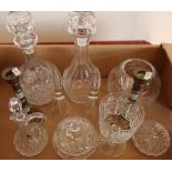 Selection of various cut glass items including a glass, two bells, two decanters and a pair of