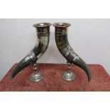 A pair of elaborate WMF silver plated mounted cows drinking horn on turned circular base, bases