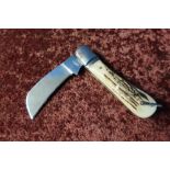 Large pruning style pocket knife by Witness Sheffield with two piece antler grips and lanyard ring