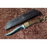 Sheffield Colt sheath knife with 4 inch blade, wooden grip and leather sheath