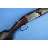 Webley & Scott 12 bore over & under single trigger ejector shotgun with 26 3/4 inch barrels, choke