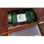 Cased Bisley 12 bore shotgun cleaning kit and a spare set of cleaning rods