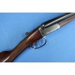 12 bore side by side shotgun by Akrill Beverly with 28 inch barrels and 14 1/2 inch straight through
