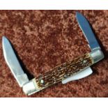 Twin bladed pocket knife I.XL George Wostenholm Sheffield, with two piece antler grips