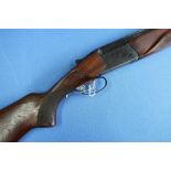 Baikal 12 bore over & under double trigger ejector shotgun with 27 1/2 inch barrels and 14 1/4