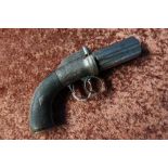 English percussion cap 6 shot pepper-box revolver with two piece checkered wooden grips and 3 inch