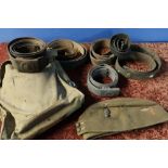 British Army side cap, gas mask, haversack, various military belts including a WWI German belt &