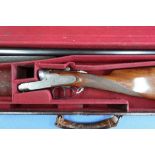 Cased 12 bore side by side shotgun by Henry Tolley & Co, with side plated action engraved Henry