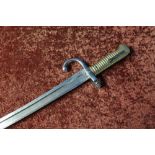 19th C French bayonet, the top strap engraved with date 1871, with ribbed grip