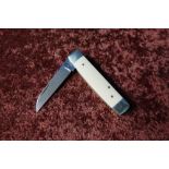 Single bladed Sheffield made pocket knife with ivory grips and working back detail