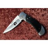 Boxed as new Elk Ridge pocket knife with 3 inch folding blade, stainless custom design ER539