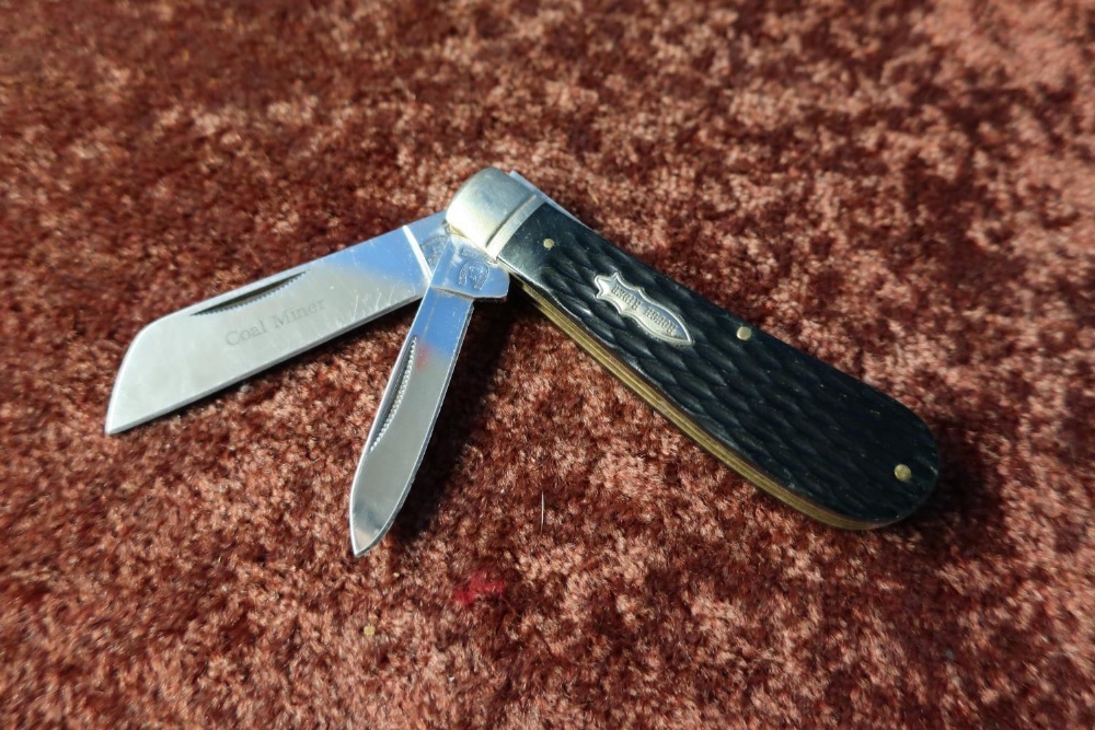 Coal Miner two bladed pocket knife by Rough Rider, with two piece lamb foot grips