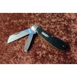 Coal Miner two bladed pocket knife by Rough Rider, with two piece lamb foot grips