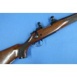 Remington 700 .243 bolt action rifle serial no. c6295211 fitted with sound moderator and scope rings