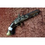 Flintlock pistol with traces of proof marks to the 7 inch barrel, with brass mounts (A/F)