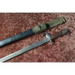 Scarce British 1907 hooked Quillon bayonet with two piece wooden grips, leather sheath and webbing