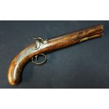 Percussion cap pistol with 8 1/2 inch barrel and engraved brass trigger guard, the action engraved