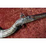 Turkish flintlock long gun with 50 inch barrel and heavily inlaid brass and Mother of Pearl stock