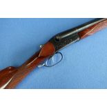 Baikal 12 bore side by side shotgun with 23 3/4 inch barrels, serial no. E05569 (section 1