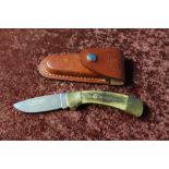 Boker 440C 3000 pocket knife with 3 inch folding blade, brass mounts and two piece horn grips,