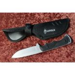 As new Gerber sheath knife with 3 1/2 inch blade No 4660417A, with two piece rubberised grip and