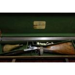 Leather cased 14 bore percussion cap double barrelled sporting gun by Thomson of Edinburgh, with