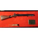 Boxed Royal Armouries miniature presentation Volley gun with associated bullet mould model