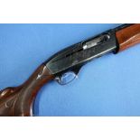 Remington Model 1100 12 bore semi auto shotgun with 25 inch barrel and 13 3/4 inch pistol grip