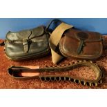 Quality leather cartridge bag with canvas strap, initials JWA and associated cartridge belt from