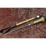 Early 20th C bamboo work riding crop with carved detail to the pommel, with screw out dagger (