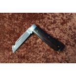 Folding pocket knife with gutting style blade by A Wright & Son Sheffield, with two piece wooden