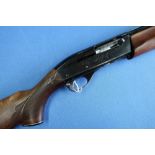 Remington Model 1100 12 bore semi auto shotgun with 25 inch barrel and 13 3/4 inch pistol grip