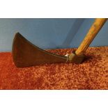 Forged steel headsman type axe with 9 inch cutting edge blade stamped with various forge marks, with
