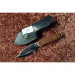 Sheffield made sheath knife with 2 1/4 inch blade and leather sheath