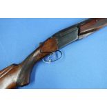 Tula 12 bore over & under double trigger ejector shotgun with 28 1/2 inch barrels and 14 1/4 inch