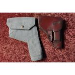 Small leather pistol holster and a RAF webbing pistol holster (2)