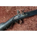 Full stocked flintlock musket with brass & steel mounts, with 33 3/4 inch barrel, the stock marked