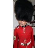 Coldstream Guards Colour Sergeants dress uniform comprising of black bear skin busby with red