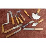 Selection of Sheffield made hand tools with turned wood handles, Petty's Celebrated Sheffield barrel