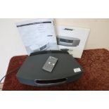 Bose wave radio/CD player with instruction manual, remote control etc