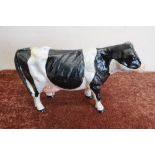 Cast metal cow (20cm high)