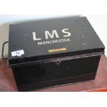 Black metal deed type box with lift up top and twin carrying handles, the top with painted detail