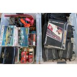 Two boxes containing a large quantity of Scalextric and Scalextric type track, cars and
