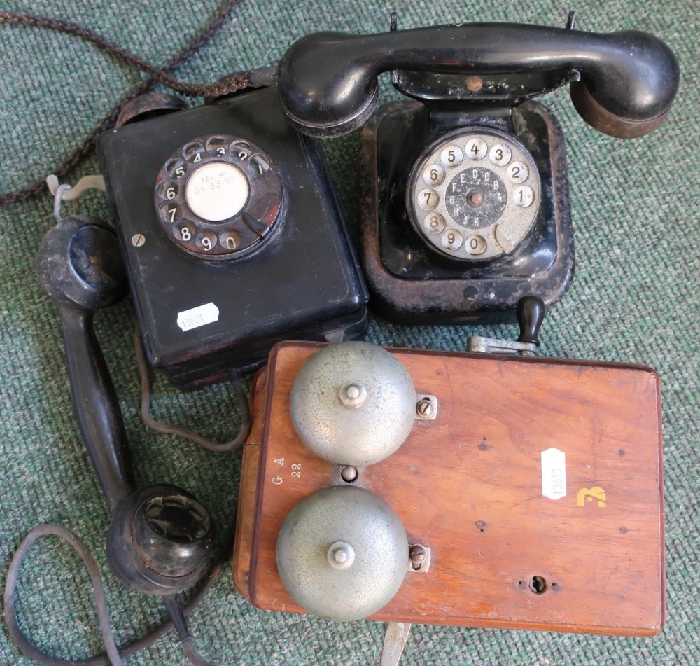 Vintage wall mounted wooden cased telephone marked GA22, another wall mounted Baker Light type