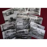 Box containing a quantity of black and white photographs and photographic prints of buses