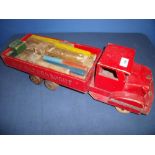 Wooden constructed toy flatbed truck with various accessories marked A-B Bil Transport