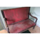 Victorian mahogany framed two seat waiting bench with upholstered seat and back on turned