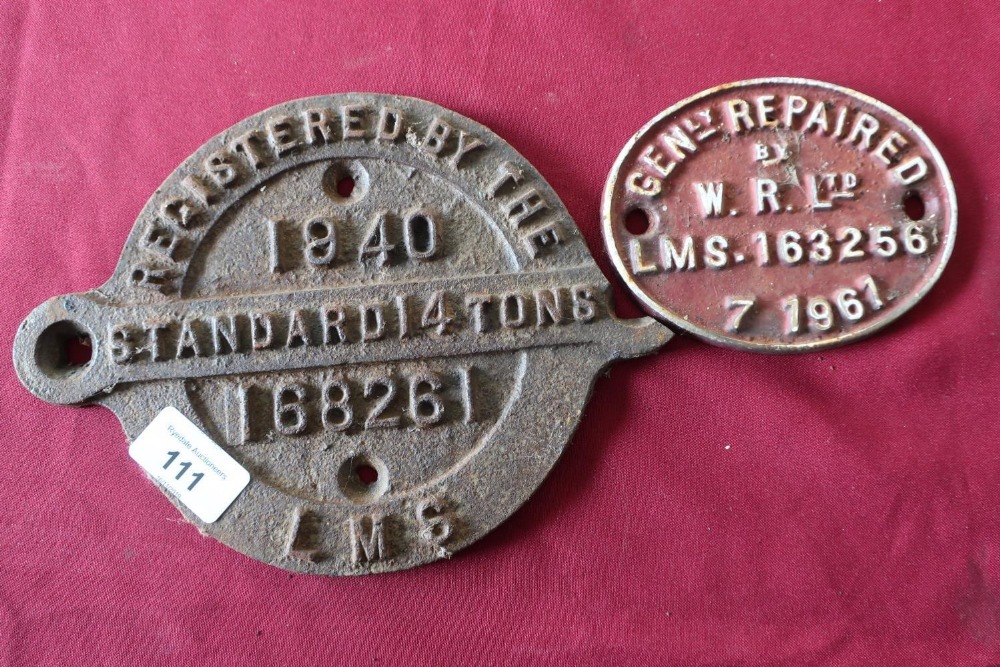 Cast metal railway wagon plate marked Registered By The LMS Standard 14 tonnes 1940 168261, and a