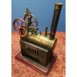 Early pre-war live steam engine with twin flywheel on rectangular base (17cm x 12cm x 24cm)